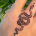 The True Meaning Behind Snake Tattoos